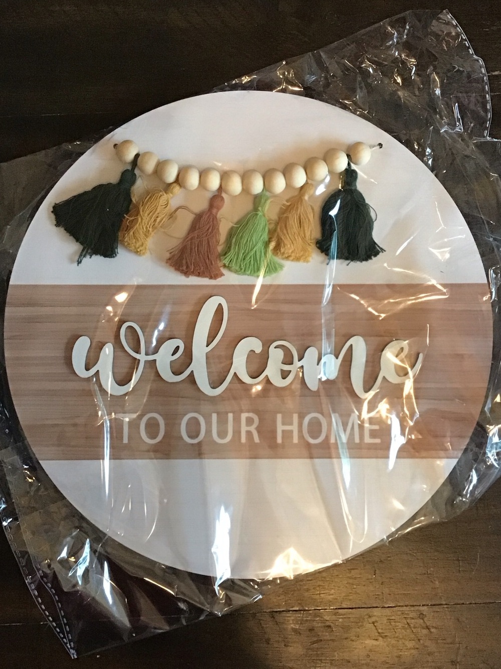 Round 'Welcome to Our Home' Wall Sign with Tassel Garland